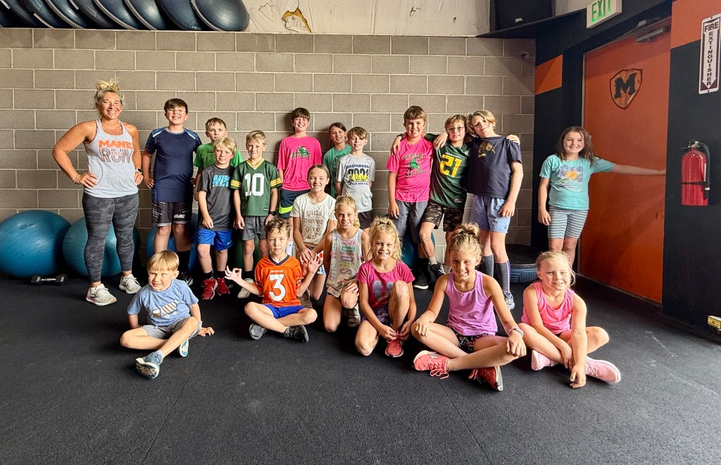 Manic Training kids posing after an intense workout training exercise fitness session